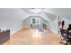 Upstairs bonus room boasts wood floors, natural light, and access to an office at 6730 Gold Wagon Ln, Mint Hill, NC 28227