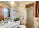 Retro bathroom featuring a sink, toilet, shower and decorative wallpaper at 7000 David Ave, Charlotte, NC 28214