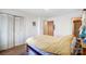 Cozy bedroom featuring a comfortable bed, closet and an ensuite bathroom at 7000 David Ave, Charlotte, NC 28214