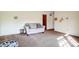 Spacious living room with carpet flooring and neutral-colored walls at 7000 David Ave, Charlotte, NC 28214
