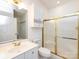 Bathroom featuring white vanity, toilet, and gold shower at 9287 Meadow Vista Rd, Charlotte, NC 28213