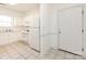 Bright, functional kitchen featuring white cabinets and essential appliances at 9287 Meadow Vista Rd, Charlotte, NC 28213