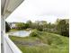 Enjoy this relaxing pool view from the unit's private outdoor patio at 9287 Meadow Vista Rd, Charlotte, NC 28213