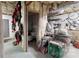 Unfinished basement with open ceiling, cluttered storage, and potential for customization at 101 Saddletree Rd, Lincolnton, NC 28092