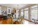 Cozy breakfast nook with views of the fireplace and backyard at 101 Saddletree Rd, Lincolnton, NC 28092