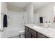 Full bathroom featuring shower-tub combo, granite countertop vanity, and tiled floors at 1027 Williamston Dr, Marshville, NC 28103