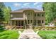 Exterior view of home with patio, manicured landscaping, and a stone pathway at 1029 Seminole Dr, Waxhaw, NC 28173