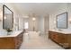 Luxurious bathroom with a standalone tub, double vanities, and elegant fixtures at 1029 Seminole Dr, Waxhaw, NC 28173