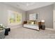 Bedroom featuring a daybed with decorative pillows, a ceiling fan, and a large window at 1029 Seminole Dr, Waxhaw, NC 28173