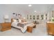 Bright bedroom with large windows, neutral colors, and comfortable furnishings at 1029 Seminole Dr, Waxhaw, NC 28173