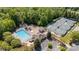 Aerial view of community amenities including a pool, playground, clubhouse, and tennis courts at 1029 Seminole Dr, Waxhaw, NC 28173