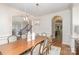 Refined dining room featuring hardwood floors, modern lighting, and seamless archways at 1029 Seminole Dr, Waxhaw, NC 28173
