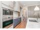 Modern kitchen featuring stainless steel appliances, custom cabinets, and marble countertops at 1029 Seminole Dr, Waxhaw, NC 28173