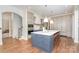 Spacious kitchen with a center island, stainless steel appliances, and custom cabinetry at 1029 Seminole Dr, Waxhaw, NC 28173