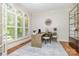 Charming office space featuring hardwood floors, arched windows and custom shelving at 1029 Seminole Dr, Waxhaw, NC 28173