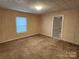Bedroom featuring one window, beige paint and carpet at 109 Starnes St, Chester, SC 29706