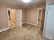 Bedroom with carpet and two closets, offering ample storage and natural light at 109 Starnes St, Chester, SC 29706