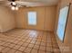 Spacious living room with tile flooring and abundant natural light at 109 Starnes St, Chester, SC 29706