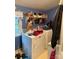 Compact laundry room with washing machine and dryer with blue painted walls at 1336 Mt Sinai Church Rd, Shelby, NC 28152