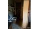 A room with storage shelves, cabinets, and a view of the house structure at 1336 Mt Sinai Church Rd, Shelby, NC 28152