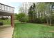 Enjoy a private backyard with lush lawn and mature trees, perfect for relaxing at 1353 33Rd Avenue Ne Dr, Hickory, NC 28601