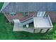 Brick home features a back patio, stairs to yard, and is well-manicured at 1353 33Rd Avenue Ne Dr, Hickory, NC 28601