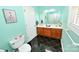 Bright bathroom with double sink vanity, tiled floor, and framed mirror at 1353 33Rd Avenue Ne Dr, Hickory, NC 28601