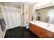 Full bathroom featuring a double sink vanity, tub/shower combo, and neutral finishes at 1353 33Rd Avenue Ne Dr, Hickory, NC 28601