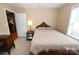Bedroom featuring carpet, bed, a window, and side table at 1353 33Rd Avenue Ne Dr, Hickory, NC 28601