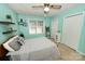 This bedroom has carpet, a ceiling fan, two closets, and refreshing wall color at 1353 33Rd Avenue Ne Dr, Hickory, NC 28601