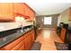 Kitchen with wood cabinets, dark countertops, and stainless steel appliances at 1353 33Rd Avenue Ne Dr, Hickory, NC 28601