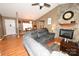 Inviting living room featuring a stone fireplace and hardwood floors at 1353 33Rd Avenue Ne Dr, Hickory, NC 28601