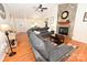 Open living room features vaulted ceiling, hardwood floors, and stone fireplace at 1353 33Rd Avenue Ne Dr, Hickory, NC 28601