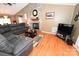 Comfortable living room with hardwood floors and a stunning stone fireplace at 1353 33Rd Avenue Ne Dr, Hickory, NC 28601