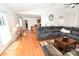 Spacious living room with hardwood floors and a large sectional couch at 1353 33Rd Avenue Ne Dr, Hickory, NC 28601