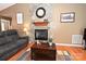Relaxing living room featuring a stone fireplace and an elegant coffee table at 1353 33Rd Avenue Ne Dr, Hickory, NC 28601