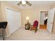 Cozy room with carpeted floor, ceiling fan, and view to adjacent room at 1353 33Rd Avenue Ne Dr, Hickory, NC 28601