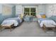 Bright, whimsical bedroom with two twin beds, a large desk, and cheerful decor at 1468 Honey Trl, Monroe, NC 28112