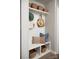 Organized mudroom featuring built-in shelving, storage baskets, and hooks for coats and hats at 1468 Honey Trl, Monroe, NC 28112