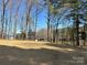 Waterfront lot featuring a private boat house with lake view at 15170 Cove Point Ln, Norwood, NC 28128