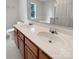 Well-lit bathroom with dual sinks and a bathtub with jets at 15188 Eric Kyle Dr, Huntersville, NC 28078
