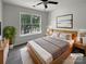 Cozy bedroom with a comfortable bed, natural light, and stylish decor at 15188 Eric Kyle Dr, Huntersville, NC 28078