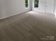 Spacious bedroom with carpet and a view of the green landscape at 15188 Eric Kyle Dr, Huntersville, NC 28078
