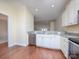 Open kitchen with modern appliances and seamless connection to living areas at 1520 Royalty Cir, Statesville, NC 28625