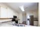 Well-lit kitchen features stainless steel appliances and stylish countertops at 1520 Royalty Cir, Statesville, NC 28625