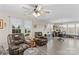 Spacious living room featuring lots of windows and comfortable seating at 1595 Cheatham Ford Rd, Hiddenite, NC 28636