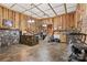 Inviting lobby features stone reception desk, open shelving, and ceramic tile floors at 1595 Cheatham Ford Rd, Hiddenite, NC 28636