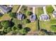An aerial view of the property with a large lawn and mature trees at 1650 Berkshire Dr, Hickory, NC 28602