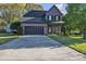 Charming two-story home featuring a two-car garage and inviting front porch at 1650 Berkshire Dr, Hickory, NC 28602
