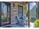 Inviting front porch with stone accents and comfortable seating at 1650 Berkshire Dr, Hickory, NC 28602